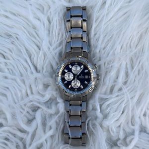 Festina stainless steel watch with blue faceplate.